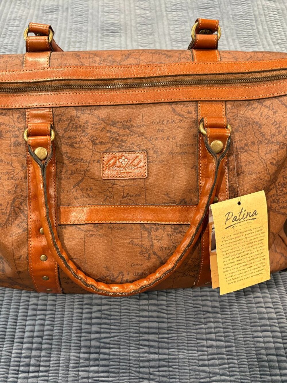 Patricia Nash Milano Weekender duffle bag in the "Riot Rust" signature European